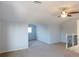 Large bonus room with neutral walls and ceiling fan at 11016 Holly Cone Dr, Riverview, FL 33569