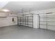 Two-car garage with overhead storage at 11016 Holly Cone Dr, Riverview, FL 33569