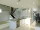 Modern kitchen featuring granite countertops and stainless steel appliances at 11016 Holly Cone Dr, Riverview, FL 33569