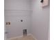 Laundry room with shelving and linoleum flooring at 11016 Holly Cone Dr, Riverview, FL 33569