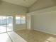Bright living room with tile floors and pool view at 11016 Holly Cone Dr, Riverview, FL 33569