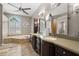 Elegant bathroom with double vanity, soaking tub, and separate shower at 1257 Kings Way Ln, Tarpon Springs, FL 34688