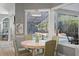 Bright breakfast nook with pool views at 1257 Kings Way Ln, Tarpon Springs, FL 34688