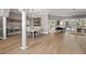 Elegant dining room with hardwood floors and view to backyard at 1257 Kings Way Ln, Tarpon Springs, FL 34688
