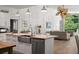 Open concept kitchen with large island, sink and views to Gathering room at 1257 Kings Way Ln, Tarpon Springs, FL 34688