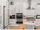 Modern kitchen with stainless steel appliances and ample cabinetry at 1257 Kings Way Ln, Tarpon Springs, FL 34688