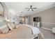 Luxurious main bedroom with ample space and access to private patio at 1257 Kings Way Ln, Tarpon Springs, FL 34688