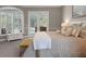 Large main bedroom with private access to the backyard and pool area at 1257 Kings Way Ln, Tarpon Springs, FL 34688