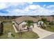 Beautiful aerial view of the home showcasing its well-maintained landscaping and curb appeal at 13387 Crest Lake Dr, Hudson, FL 34669