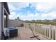 Brick patio features a view of the pond at 13387 Crest Lake Dr, Hudson, FL 34669