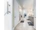 En-suite bathroom with a walk-in shower and a view into the walk-in closet at 14015 Kingfisher Glen Dr, Lithia, FL 33547