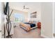 Spacious bedroom with a comfortable bed and plenty of natural light at 14015 Kingfisher Glen Dr, Lithia, FL 33547