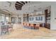 Community clubhouse with a bar and lounge area at 14015 Kingfisher Glen Dr, Lithia, FL 33547
