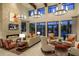 Elegant clubhouse lounge with fireplace and seating at 14015 Kingfisher Glen Dr, Lithia, FL 33547