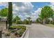 Gated community entrance with security access at 14015 Kingfisher Glen Dr, Lithia, FL 33547