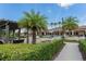 Resort-style pool with pergola, lounge chairs and palms at 14015 Kingfisher Glen Dr, Lithia, FL 33547