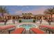 Large community pool and spa with lounge chairs at 14015 Kingfisher Glen Dr, Lithia, FL 33547