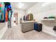 Large walk-in closet with ample shelving and hanging space at 14015 Kingfisher Glen Dr, Lithia, FL 33547
