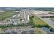 Aerial view of a house in a residential area at 1703 Alhambra Crest Dr, Ruskin, FL 33570