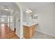Bathroom boasts a vanity with wood cabinets and tiled floors at 1703 Alhambra Crest Dr, Ruskin, FL 33570