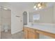 Main bathroom with vanity, tiled floor, and a separate toilet and shower at 1703 Alhambra Crest Dr, Ruskin, FL 33570