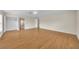 Spacious Primary bedroom with wood-look floors and ample closet space at 1703 Alhambra Crest Dr, Ruskin, FL 33570