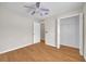 Bedroom with ceiling fan and wood floors at 1703 Alhambra Crest Dr, Ruskin, FL 33570