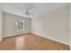 Bedroom with window, wood floors and fan at 1703 Alhambra Crest Dr, Ruskin, FL 33570