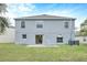 Gray two-story house with backyard patio at 1703 Alhambra Crest Dr, Ruskin, FL 33570