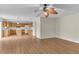Spacious living room with wood floors and ceiling fan at 1703 Alhambra Crest Dr, Ruskin, FL 33570