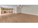 Large living area with wood floors and access to backyard at 1703 Alhambra Crest Dr, Ruskin, FL 33570