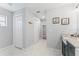 Elegant bathroom with marble flooring and double sinks at 17447 Spring Valley, Dade City, FL 33523