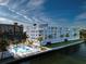 Aerial view of building with pool and waterway access at 18325 Gulf Blvd # 405, Redington Shores, FL 33708