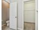 Bathroom with toilet and walk in closet at 21093 Wistful Yearn Dr, Land O Lakes, FL 34637