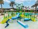 Brightly colored water playground with slides at 21093 Wistful Yearn Dr, Land O Lakes, FL 34637