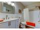 Well-lit bathroom with white cabinets, modern fixtures, and a shower-tub combination with white subway tile at 2284 Philippine Dr # 71, Clearwater, FL 33763