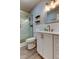 Bathroom showcasing a sleek glass shower, white vanity, and modern design elements at 2284 Philippine Dr # 71, Clearwater, FL 33763