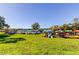 Community canoe storage area near the lake, featuring multiple canoes for residents' enjoyment and recreation at 2284 Philippine Dr # 71, Clearwater, FL 33763