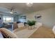 Open floorplan showing dining area with table connected to the living area and balcony at 2284 Philippine Dr # 71, Clearwater, FL 33763