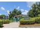 Community dog park with shady seating and grassy areas, perfect for pets and their owners at 2284 Philippine Dr # 71, Clearwater, FL 33763