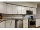 Updated kitchen with stainless steel appliances, subway tile backsplash, and granite countertops at 2284 Philippine Dr # 71, Clearwater, FL 33763