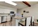 Open kitchen with granite island, stainless steel appliances and breakfast bar seating at 2284 Philippine Dr # 71, Clearwater, FL 33763