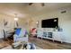 A bright living room offers comfortable seating, stylish decor, and a modern entertainment center at 2284 Philippine Dr # 71, Clearwater, FL 33763