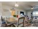 Cozy dining area adjacent to a living room with modern decor, and a relaxing atmosphere at 2284 Philippine Dr # 71, Clearwater, FL 33763