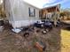 Mobile home with covered porch and ramp access at 26418 Dayflower Blvd, Wesley Chapel, FL 33544