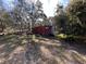 Large storage container in yard at 26418 Dayflower Blvd, Wesley Chapel, FL 33544