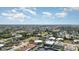 Aerial showing neighborhood, waterfront homes and canal at 2700 Magdalina Dr # 2B, Punta Gorda, FL 33950