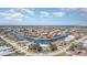 Aerial view of waterfront community with many houses and boats at 2700 Magdalina Dr # 2B, Punta Gorda, FL 33950