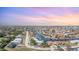 Aerial view of neighborhood at sunset with waterfront homes at 2700 Magdalina Dr # 2B, Punta Gorda, FL 33950