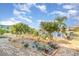 Landscaped backyard with brick pavers and tropical plants at 2700 Magdalina Dr # 2B, Punta Gorda, FL 33950